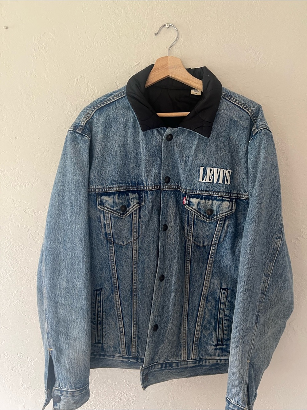 Levi's Light Blue Denim Jacket with Black Collar and Chest Logo
